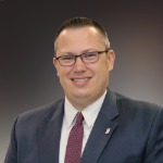 Tyler L. Webb